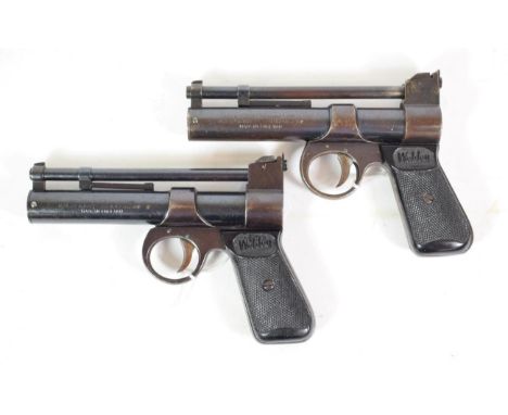 PURCHASER MUST BE 18 YEARS OF AGE OR OVER Two Post-War Webley Junior .177 Calibre Air Pistols, each with blued finish and bla