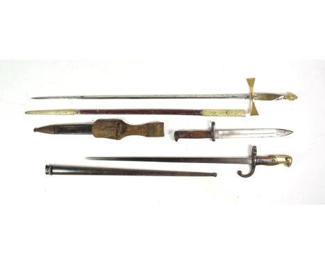 A German Model 1871/84 Knife Bayonet, with Suhl blade, steel mounted leather scabbard and leather frog;a French Model 1874 Gr