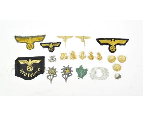 A Small Quantity of German Third Reich Badges, including a Railway Police Reichsbahn embroidered arm eagle sleeve patch for H