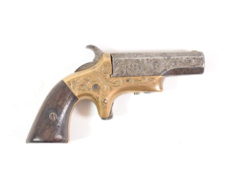 A Southerner Derringer Rimfire Pistol, the 6cm octagonal steel barrel engraved K.B.Ellis to the underside and stamped SOUTHER