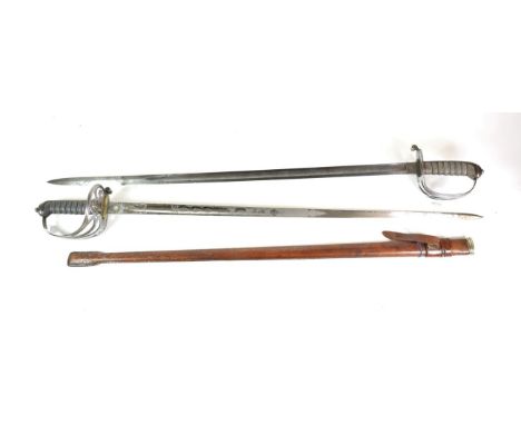 A George V 1854 Pattern Sword to an Officer of the Welsh Guards, the 82.5cm single edge steel blade etched with the Royal cyp