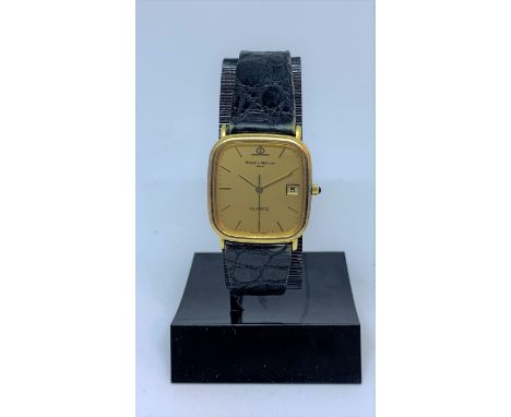 BAUME & MERCIER. Men's dress watch with reference number 17364 from the 70sThe 18k yellow gold case is very elegant, with a d