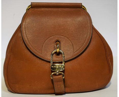 DELVAUX. "Cerceau" model bag with shoulder strap or carried by hand. Beginning of the 90s (certificate). Cognac-colored leath