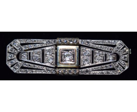 White gold Art-Deco BROOCH, set in its center with a 0.10ct (G / H) diamond. Weight: 6g