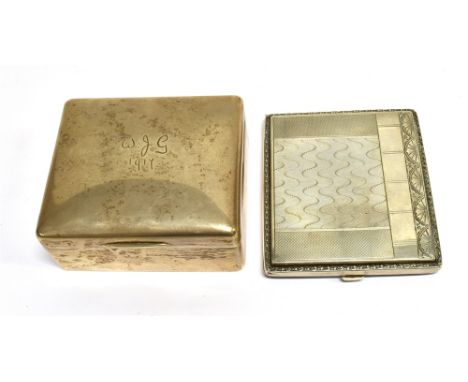 AN EARLY 20TH CENTURY ENGINE TURNED SQUARE CIGARETTE CASE AND A SILVER MOUNTED CIGARETTE BOX the case with engine turned pane