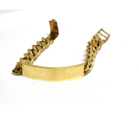 A MODERN 9CT GOLD TEXTURED-CURB LINK IDENTITY BRACELET  on a ladder clasp, London 1978, approx. 12mm wide, approx. 22cm long 