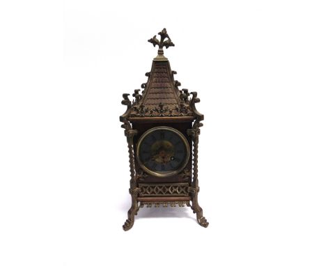 A LATE 19TH CENTURY FRENCH 8-DAY MANTLE CLOCK  the movement stamped 'A D MOUGIN', in a Gothic style brass mounted pagoda case