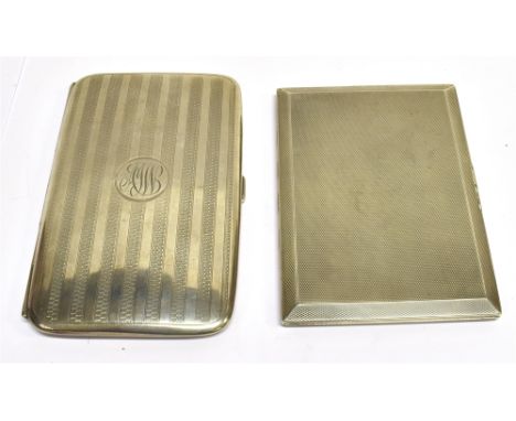 TWO EARLY 20TH CENTURY SILVER ENGINE TURNED RECTANGULAR CIGARETTE CASES one with rounded corners, engine turned bands and a r