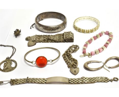 A COLLECTION OF SILVER AND WHITE METAL JEWELLERY  including; an 'archer-bird' pendant or charm; a seven-bar gate bracelet; a 
