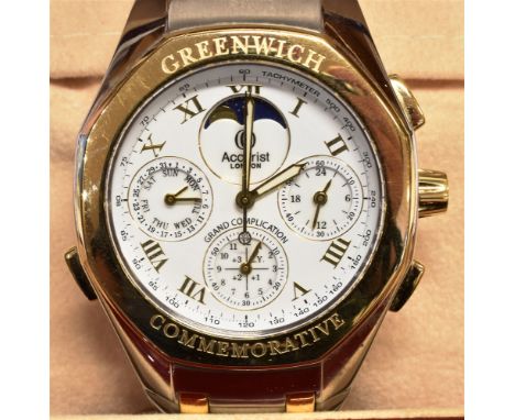 ACCURIST, GRAND COMPLICATIONS, A GENTLEMAN'S STAINLESS STEEL AND GILT QUARTZ BRACELET WATCH FROM 'THE GREENWICH COMMEMORATIVE