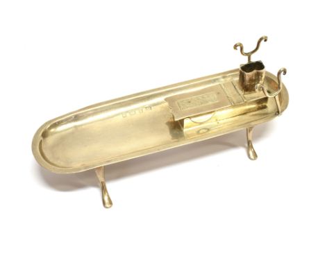 A SILVER OBLONG INK STAND ON FOUR FEET one end with a pen rest, a wax stick stand and a match box with a hinged lid, mark of 