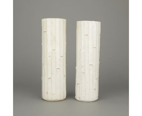 Pair of Mid-Century Modern tall ceramic folkware vases from Mashiko, Japan. Stoneware clay body with faceted decoration. Appl