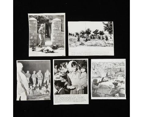 Group of five gelatin silver prints and original vintage photographic reproductions related to the war in Israel from the arc