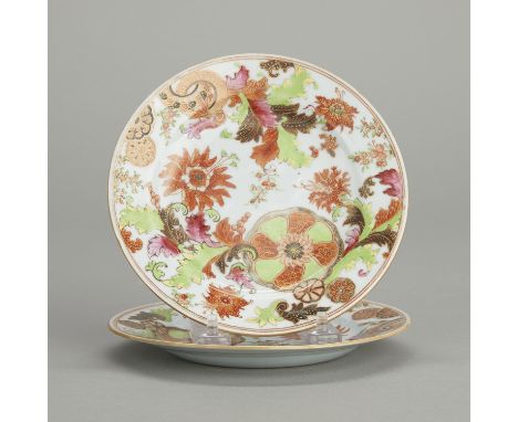 Pair of Chinese Qianlong 18th-century pseudo-tobacco leaf porcelain saucers. Decorated with bright green, iron red, brown, an