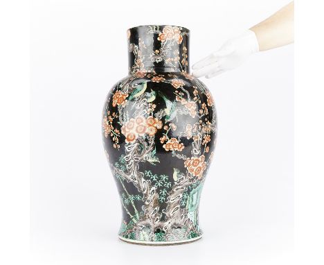 Large 19th century Chinese famille noire porcelain vase decorated with birds on flowering branches against a black ground. Ma