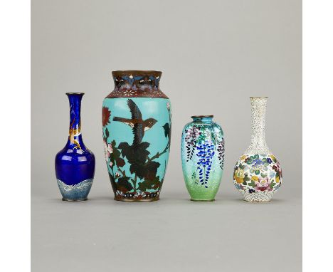 Group of four antique Japanese cloisonne vases. Two depicting flowers, one with a bird, and one with a dragon.Height ranges f