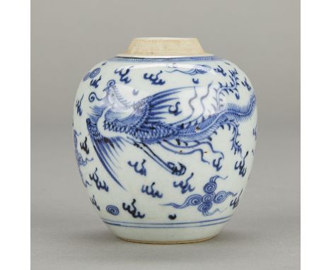 Small Chinese Guangxu blue and white porcelain ginger jar. Decorated with two phoenixes among flames. Lacking a lid.Height: 4