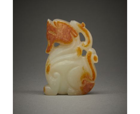 Chinese jade carving in the form of a dragon or other mythical beast. One side with russet inclusions.Height: 1 3/4 in x widt