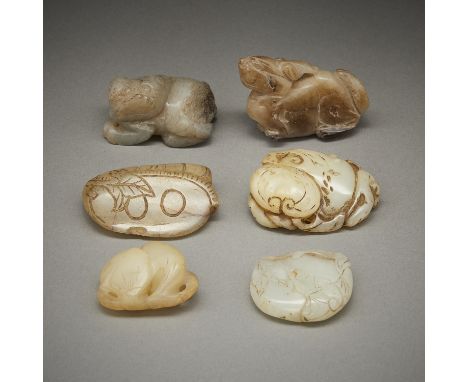 Group of six Chinese carved jade figures including bean pods, a foo dog or lion, a mythical horned beast, a gourd, peaches, a