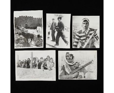 Group of five gelatin silver prints and original vintage photographic reproductions related to the war in Israel from the arc