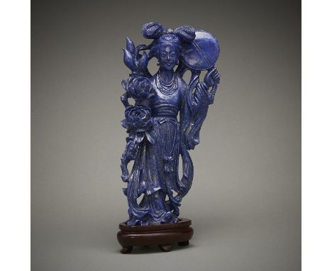 Chinese carved lapis lazuli figure depicting Chang'e, the Chinese moon goddess. With a wooden stand.Height: 8 3/4 in x width: