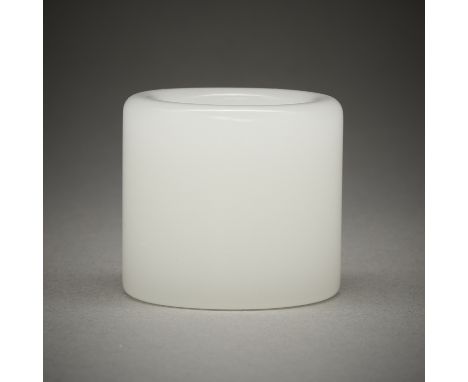Chinese glass archer's ring. Of a white coloration to imitate white jade.Height: 1 1/4 in x diameter: 1 1/4 in.Condition:The 