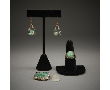 Group of five pieces of Chinese jade jewelry including:One pair of earrings in unmarked metal on French wires with tear drop 