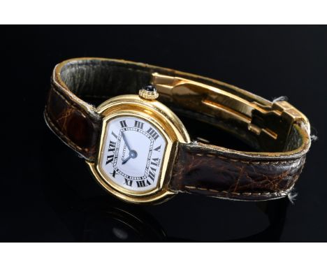 Cartier Ellipse Mini Gelbgold 750 Damenarmbanduhr, Handaufzug, weißes Zifferblatt, römische Zahlen, blauer Spinell auf der Kr