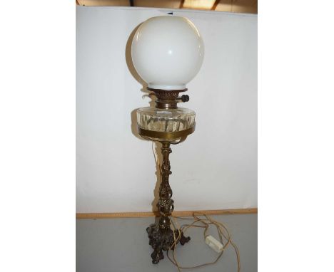 Victorian oil lamp with cast metal base later converted to electricity
