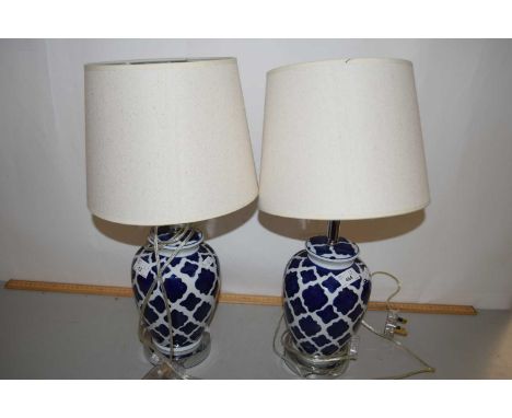 Pair of modern table lamps with blue and white ceramic bases