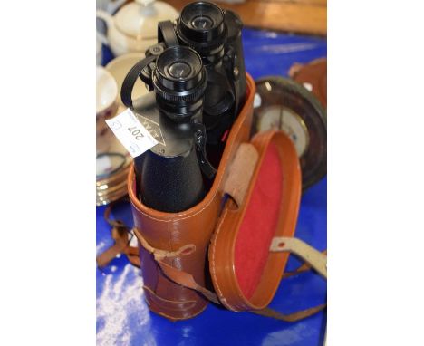 Pair of Ajax binoculars together with a vintage leather cased tape measure and a bedside clock