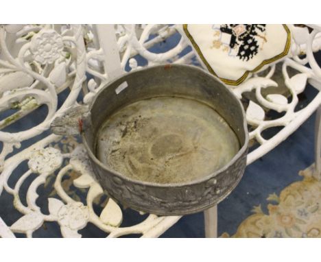 A lead circular planter, cast in relief with cherubs, together with a white bird bath, cast iron