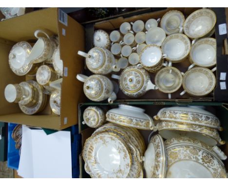 A large dinner service of Spode, Minton and Wedgwood gilded china (a mix/match set) 