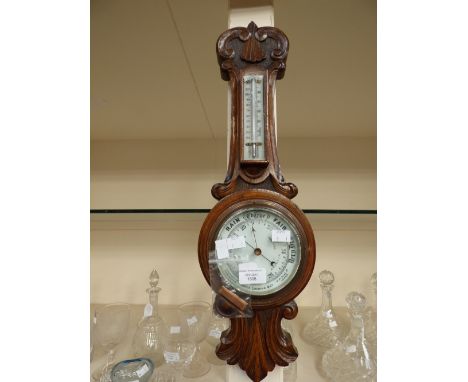 A Victorian oak barometer James Lucking and Co, Birmingham and Leeds 