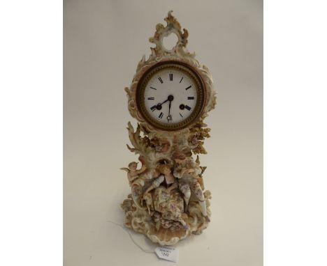 A late 19th Century Continental porcelain cased mantel clock, enamel dial, bell strike 
