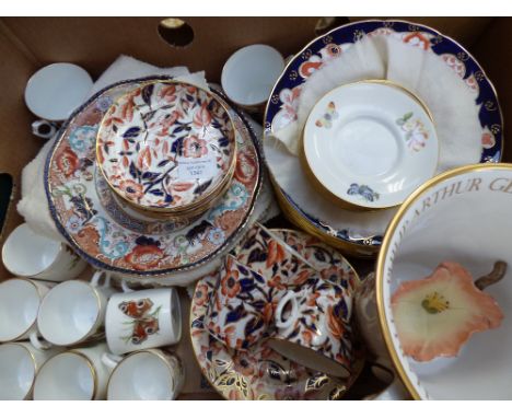 A large quantity of Staffordshire Imari style plates including tea cups together with Worcester coffee cans and a Spode comme