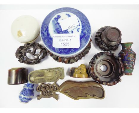 A collection of assorted Oriental items, including a blue and white circular lidded trinket box, a miniature cloisonné vase, 