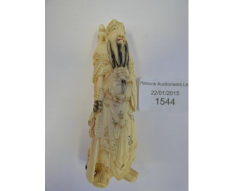 An ivory netsuke of sage 