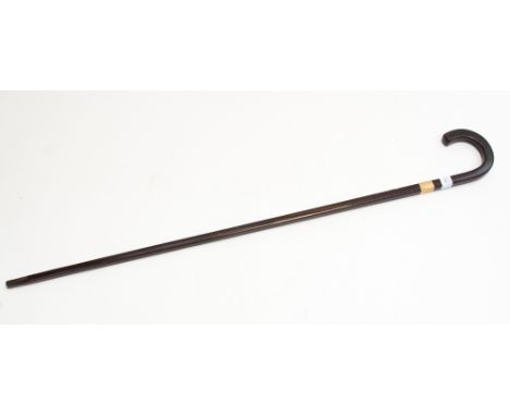 A Tiffany & Co 18ct gold rosewood collared walking stick, of square tapered outline, monogrammed EKW, with horn tip, 92cm lon