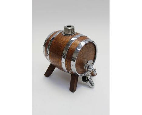 A 1930s chrome and oak 'sherry' barrel decanter with functioning tap (had been converted to lamp but still in original useabl