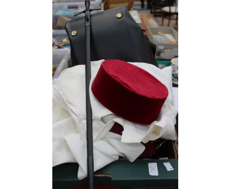 A Knights Templar robe, cape, belt, sword, medallions, hat, books, etc 