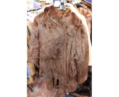 Two items, first 1920s Squirrel coat by Derry and Toms of Kensington 'by appointment' with a mandarin collar, angled barrel c