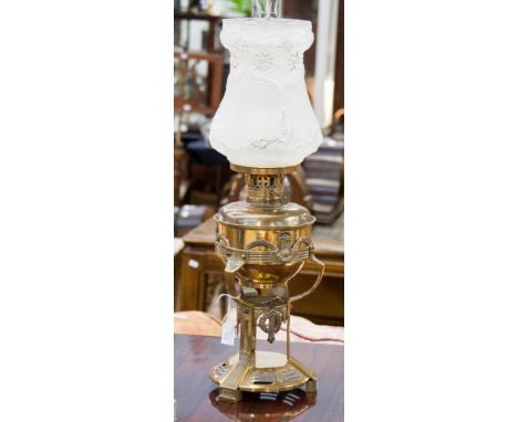 A Dutch oil lamp; brass with 'Empire Esque' styling, glass funnel and opaque glass shade by Fusco's B.V. Enschede Holland (th