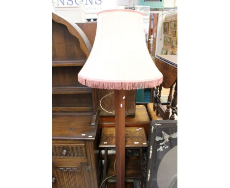 An Art Deco oak standard lamp