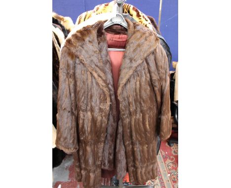 Two Squirrel coats, first Maxson 1940s swing coat full shawl collar, self lined cuffs supplied by Schofields, second Schofiel