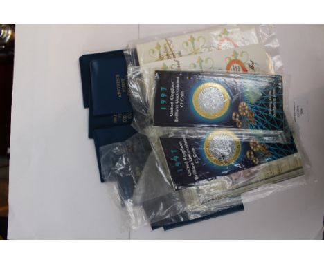 UK presentation packs of £2 - 1989 x 3, 1994 x 2, 1997 x 4, £1 - 1983, 1984, 1987, 1988 x 2, 50p - 1994 x 2 and Britain's fir