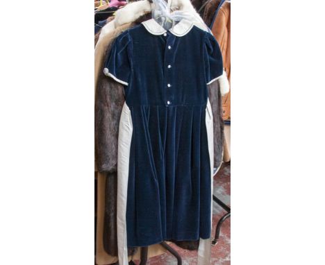 A late 20th Century blue velvet dress, short sleeves with light blue silk roses and sash; together with two ladies pill box h