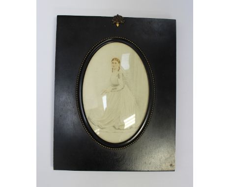 A 19th Century oval full length portrait, in a later black frame 
