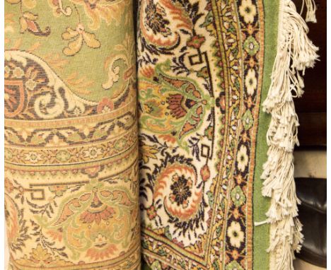 A large Wilton wool carpet/rug, with a floral pattern 
