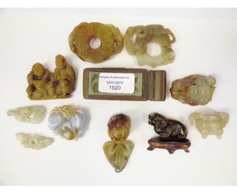 A collection of assorted jade, mostly 20th century, comprising miniatures, figures, etc